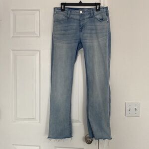 Rock and Roll Cowgirl light denim jeans.